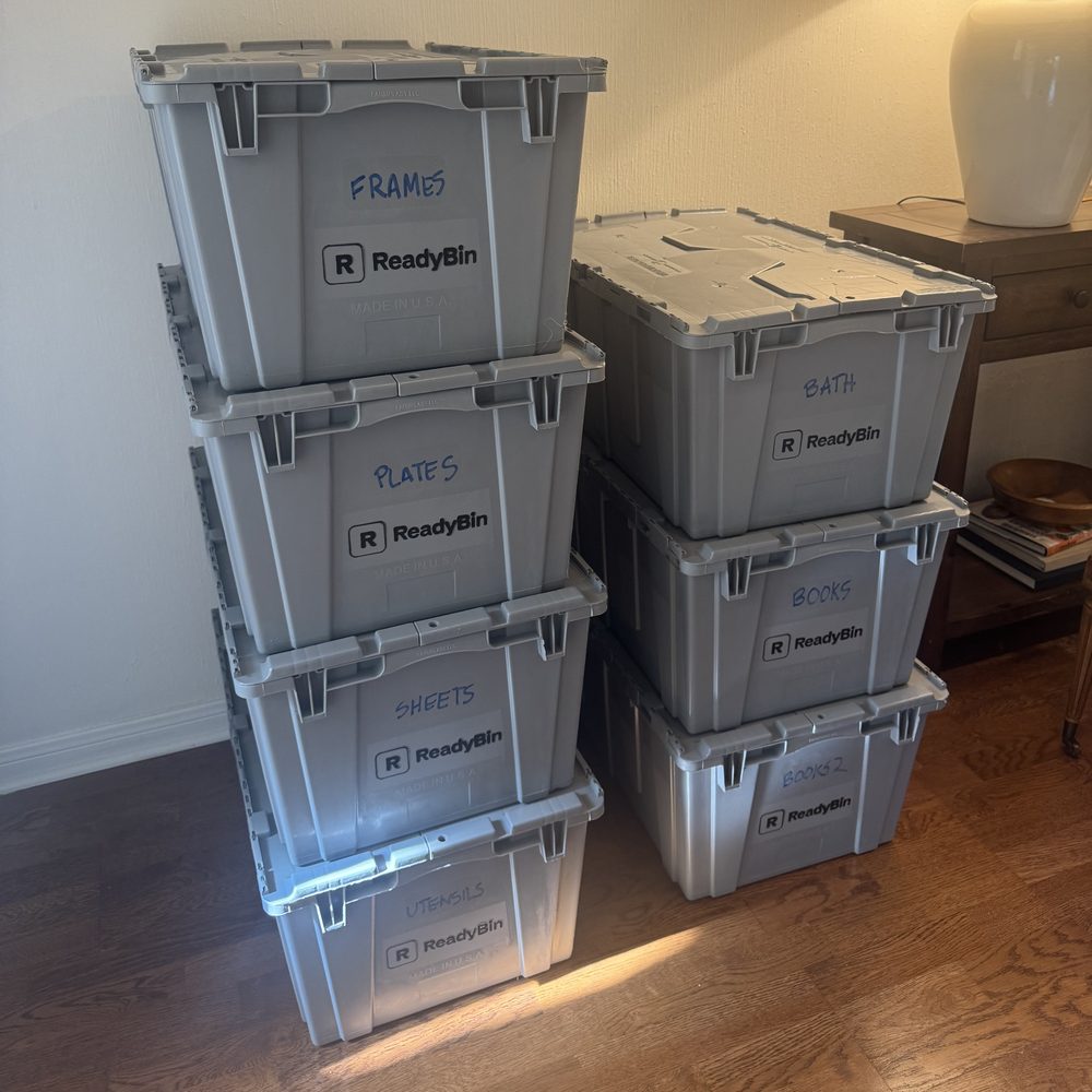 Packed ReadyBin bins labeled by room